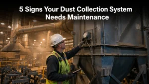 5 signs your dust collection system needs maintenance — hero image of an industrial baghouse dust collector.